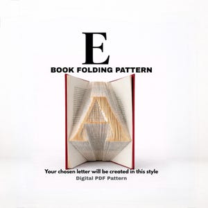 May include: A book with red covers is open to reveal the letter "A" formed by folded pages. The text "BOOK FOLDING PATTERN" and "Your chosen letter will be created in this style Digital PDF Pattern" are displayed.