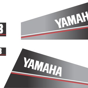 May include: Yamaha decals in black, grey, and white. The Yamaha logo is displayed prominently. One decal includes the number 8. A red and white stripe accents the design. Ideal for marine vehicles.