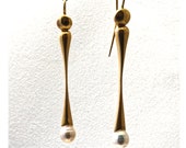 Earrings in gold with pearls