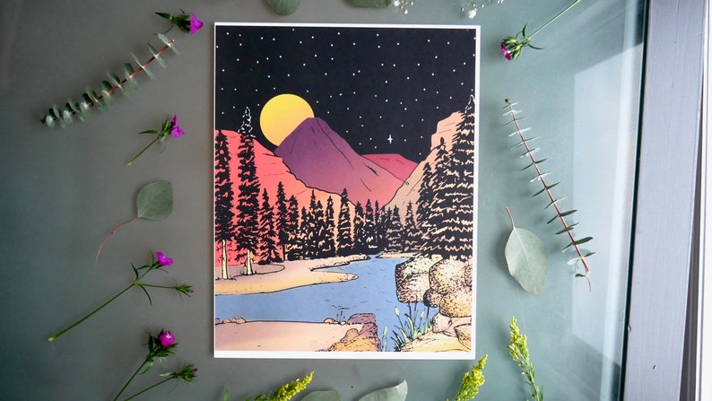 May include: A retro-style print of a nighttime landscape with a full moon, mountains, and a river winding through a forest. The colors are vibrant and the style is reminiscent of 1970s art.