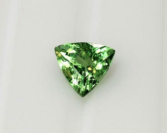 Trillion Tsavorite Garnet 6 mm, this apple green stone weighs 0.81 carats and comes from Kenya