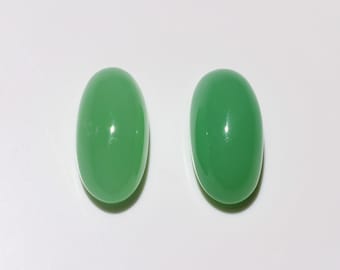 Pair of elongated oval Chrysoprases 12.6x6.6 mm, these translucent apple green microcrystalline quartz from Australia weigh 7.24 carats