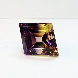 Large Ametrine diamond cut diamond 29x23x15 mm, this large stone from Bolivia weighs 35.84 carats