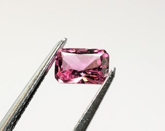 Radiant candy pink tourmaline 6x4, this sparkling neon pink stone weighs 0.61 carat and comes from Brazil