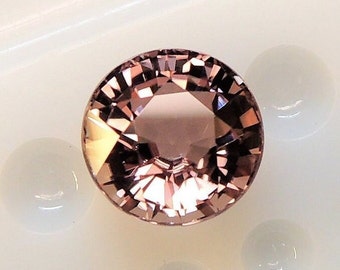 Pink milk chocolate tourmaline, this large round gem calibrated 9.0 mm weighs 3.52 carats and comes from Africa.