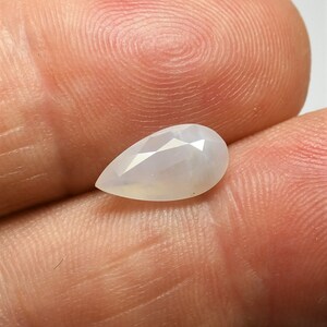 Paperish white sapphire opalescent pear 11.3x6.1 mm this large milky and translucent stone weighs 2.21 carat and comes from Sri Lanka