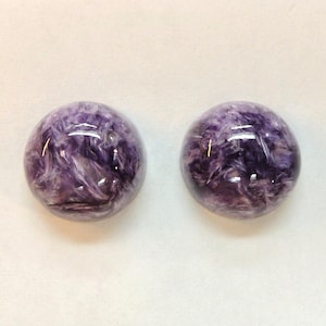 Charoite pair, round 11mm cabochons, these marbled purple cabochons come from Siberia in Russia and weigh 10.67 carats. image 2