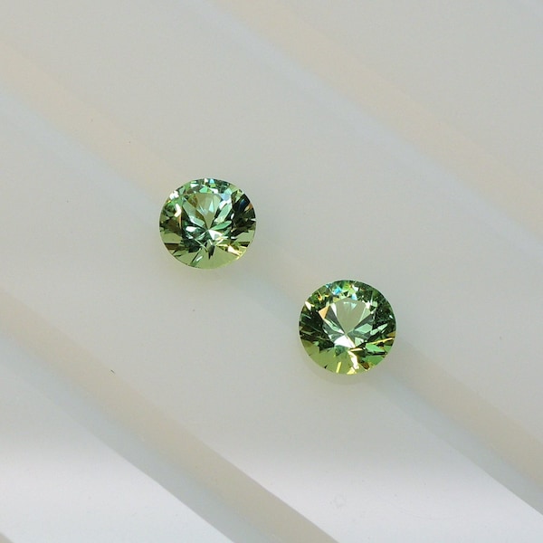 Grossular garnet from Merelani - Tanzania, this pair of round 4 mm mint green stones weighs 0.59 carat