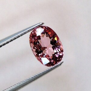 Medium pink elongated oval tourmaline, this stone measures 6.0x8.6mm, weighs 2.02 carats and comes from Africa