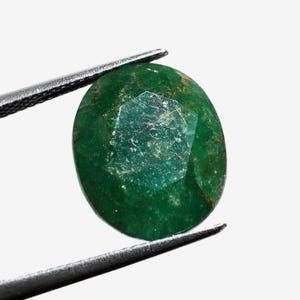 Large oval 16x13mm forest green emerald, this deep Zambian beryl weighs 13.25 carats, it is untreated, unoiled