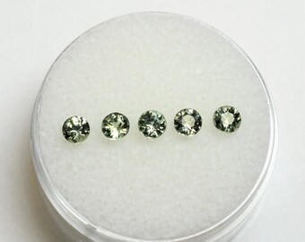 Round green blue sapphires 3.3 to 3.4 mm, this lot of 5 brilliant corundums weighs 0.96 carat and comes from Africa