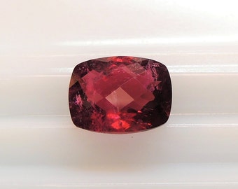 Tourmaline red raspberry elongated cushion 8.1x10.1 mm, this pinkish red gem has a chessboard cut, this rubellite weighs 2.82 carats