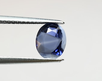 Two-tone sapphire blue ink to oval white 7.7x6.2 mm, Are you looking for a unique stone?  This 1.36 carat stone will fit perfectly