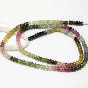 A strand of multicolored tourmalines, 3.4 to 3.6 mm, this string of small, faceted, rainbow-colored beads measures 14 inches