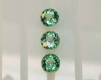 Apatite trio green sea paraiba, the stones of this trio measure 6.3-6.4-6.5mm, weigh 3.26 carats and come from Madagascar