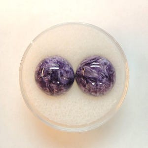 Charoite pair, round 11mm cabochons, these marbled purple cabochons come from Siberia in Russia and weigh 10.67 carats. image 10