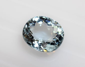 Oval aquamarine 10.7x9.3 mm, this pastel blue green Brazilian beryl Portuguese cut weighs 3.73 carats