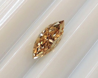 Marquise champagne brown diamond 3.9x9.3 mm, this untreated natural colored diamond weighs 0.64 carat