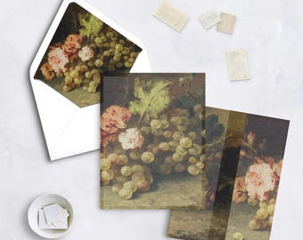 May include: Greeting cards with a vintage still life painting of grapes and flowers. The cards feature a white envelope with the same artwork inside, along with stamps and a small dish of stamps. The artwork has a dark background with light green grapes and pink and white flowers.