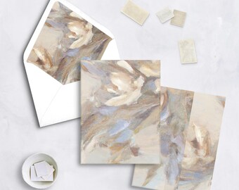 May include: Stationery set featuring an abstract floral design in neutral tones of beige, brown, and blue. Includes an envelope, notecards, and stamps. The artwork is reminiscent of a watercolor painting.