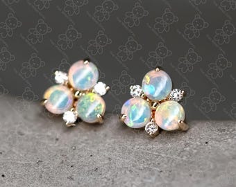 14 kt geelgouden Australische massief opaal diamanten trio-oorknopjes