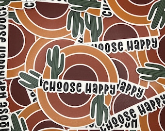 May include: A stack of round stickers with a desert-themed design. Each sticker features a cactus with a brown, orange, and red background. The text "Choose Happy" is printed on each sticker.