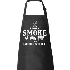 May include: Black apron with a white graphic that says "I only smoke the good stuff" with a chicken, pig, and cow illustration.
