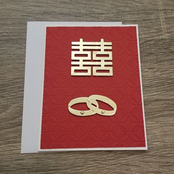 Chinese wedding card. Wedding card with Chinese calligraphy. Double happiness chinese wedding card. Wedding ring card.