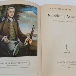 May include: An open hardcover book titled Rabble In Arms by Kenneth Roberts, published by Doubleday & Company, Inc. in 1947. The left page features a color portrait of Peter Merrill of Arundel, while the right page displays the title and text.