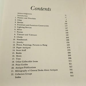 May include: An open book page displaying a detailed table of contents. The title "Contents" is at the top, followed by numbered entries like "Pottery and Porcelain," "Glass," and "Books," with corresponding page numbers.
