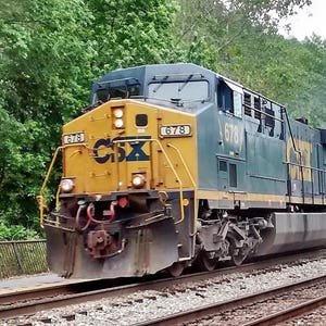 CSX AC60CW Leads a Freight Train - Photograph
