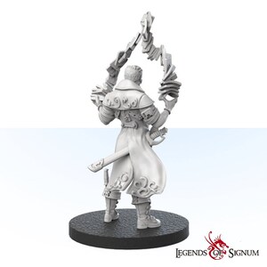 May include: A white plastic miniature figurine of a person wearing a long coat and holding a deck of cards in their hands. The figurine is standing on a round black base. The text "Legends of Signum" is printed on the base.