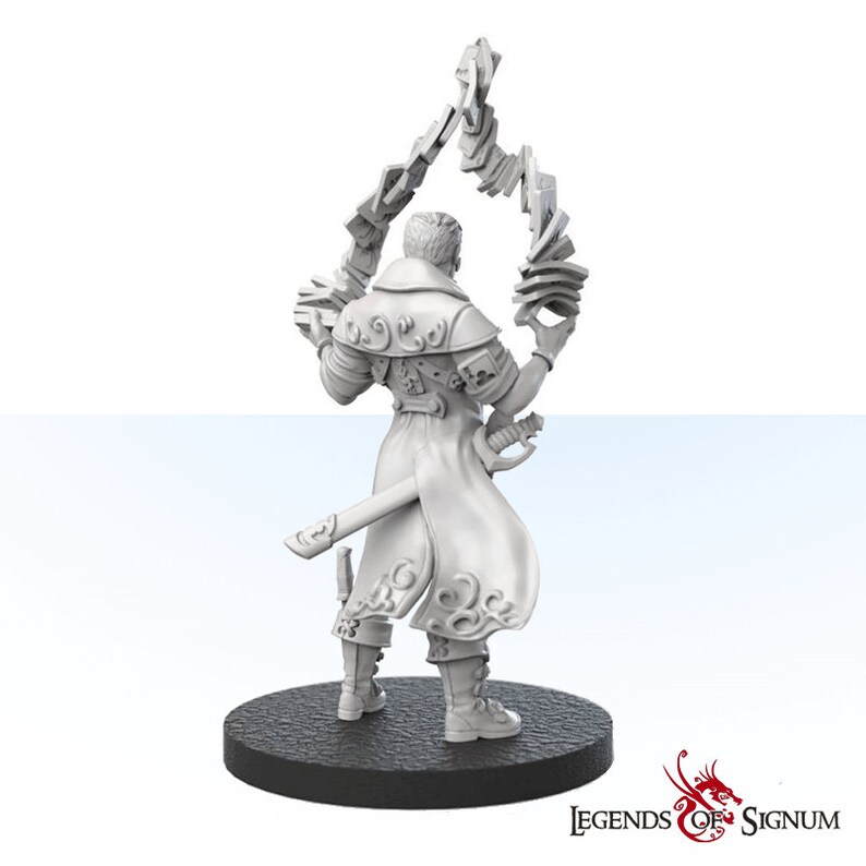 May include: A white plastic miniature figurine of a person wearing a long coat and holding a deck of cards in their hands. The figurine is standing on a round black base. The text "Legends of Signum" is printed on the base.