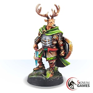 May include: A painted miniature figurine of a deer-like humanoid warrior wearing green and brown armor, holding a staff and a shield. The figurine is standing on a rocky base with green grass.
