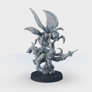 May include: A gray miniature figurine of a fantasy creature, featuring a humanoid figure with a hat and a large insect-like creature on its back. The figurine is mounted on a black circular base.