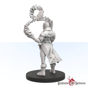 May include: A white painted miniature figurine of a person wearing a long coat and holding a deck of cards in their hand. The cards are swirling around the person's hand. The figurine is standing on a black base with the words "Legends of Signum" printed on it.