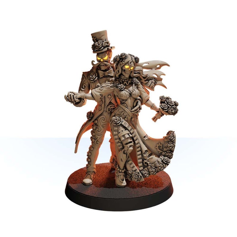 May include: A skeletal couple dressed in wedding attire, the groom wearing a top hat and the bride holding a bouquet of flowers. The couple is posed in a dancing position, with the groom holding the bride's hand. The figurine is painted in a light brown color.
