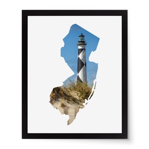 May include: A black and white lighthouse with a black and white striped tower stands on a sandy beach with green grass. The lighthouse is inside the outline of the state of New Jersey.