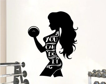 May include: Black and white silhouette of a woman lifting a dumbbell with the text "YOU CAN DO IT" written on her body.