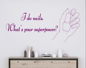 May include: Purple text on a white wall reads "I do nails. What's your superpower?" with a line drawing of a hand holding a bottle of nail polish.