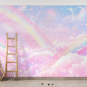 Peut inclure: Un fond aquarelle rose pastel, bleu et blanc avec un arc-en-ciel et des étoiles. Le fond est parfait pour une chambre de bébé ou d'enfant.