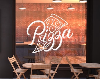 May include: A storefront with a large white sign that says "Pizza" with a slice of pizza graphic. There are four wooden chairs and two tables in front of the storefront.
