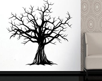 May include: Black silhouette of a bare tree with many branches, a thick trunk, and roots. The tree is on a white background.