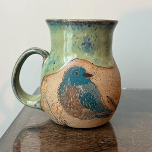 Hand-Carved Blue Bird Ceramic Mug: Woodland Pottery Coffee Cup