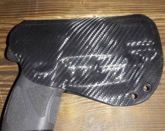 Taurus G3C Custom Kydex Holster with Viridian Laser Black Carbon Fiber plus 11 more colors to choose from. Lifetime Warranty.  Made in U.S.A