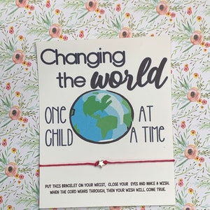Cambiando el mundo Un niño a la vez, tarjeta con mensaje, recuerdo, manzana, favorito, asistente de cátedra, escuela, administrativo, administración, maestros APRECIACIÓN