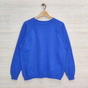 VTG des années 90 Hanes uni Raglan Sweatshirt grand vintage Hanes Sport blanc pull pull pull ras du cou bleu taille L