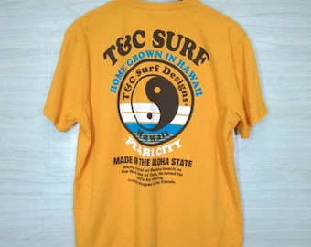 Camiseta hawaiana Vintage T&C Surf Designs "Endless Wave Tour" - Gráfico de lugar de surf de los 90, Yin Yang negra, talla L, camiseta naranja grande