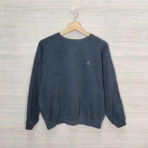 Sweatshirt girouette vintage girouette col rond raglan noir pull court femme taille moyenne