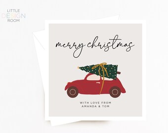 May include: A red car with a green Christmas tree on top. The car has a yellow bow on the tree and the text "merry christmas" is written above the car. The text "with love from Amanda & Tom" is written below the car.
